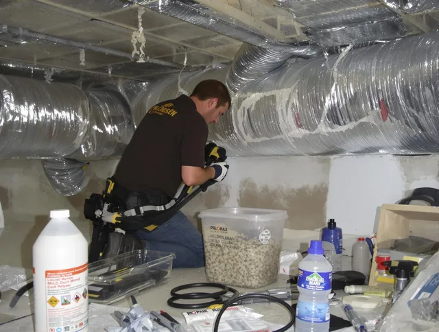 Kingston Air Duct Cleaning specialist performing professional mold removal from air ducts in Kingston