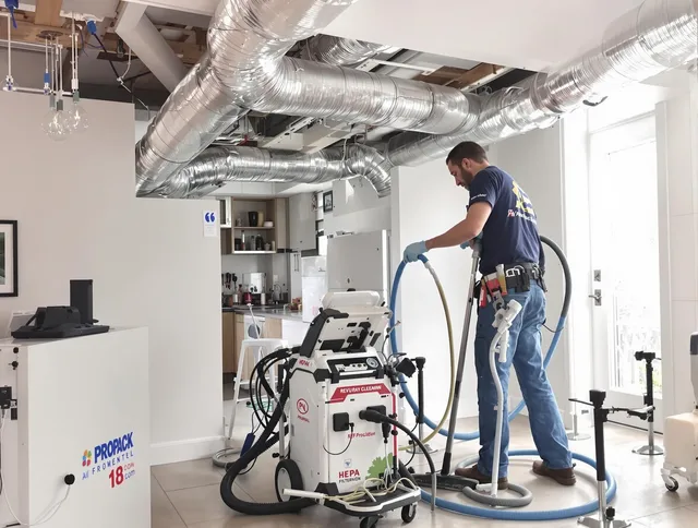 Kingston Air Duct Cleaning technician performing advanced pure duct cleaning with specialized equipment in Kingston